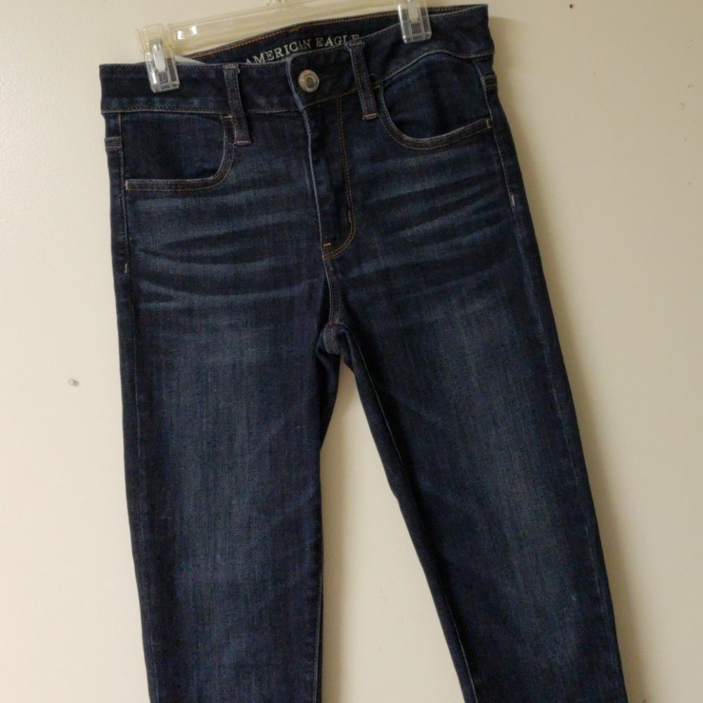 Dark Wash Jeans With Distressed Hem